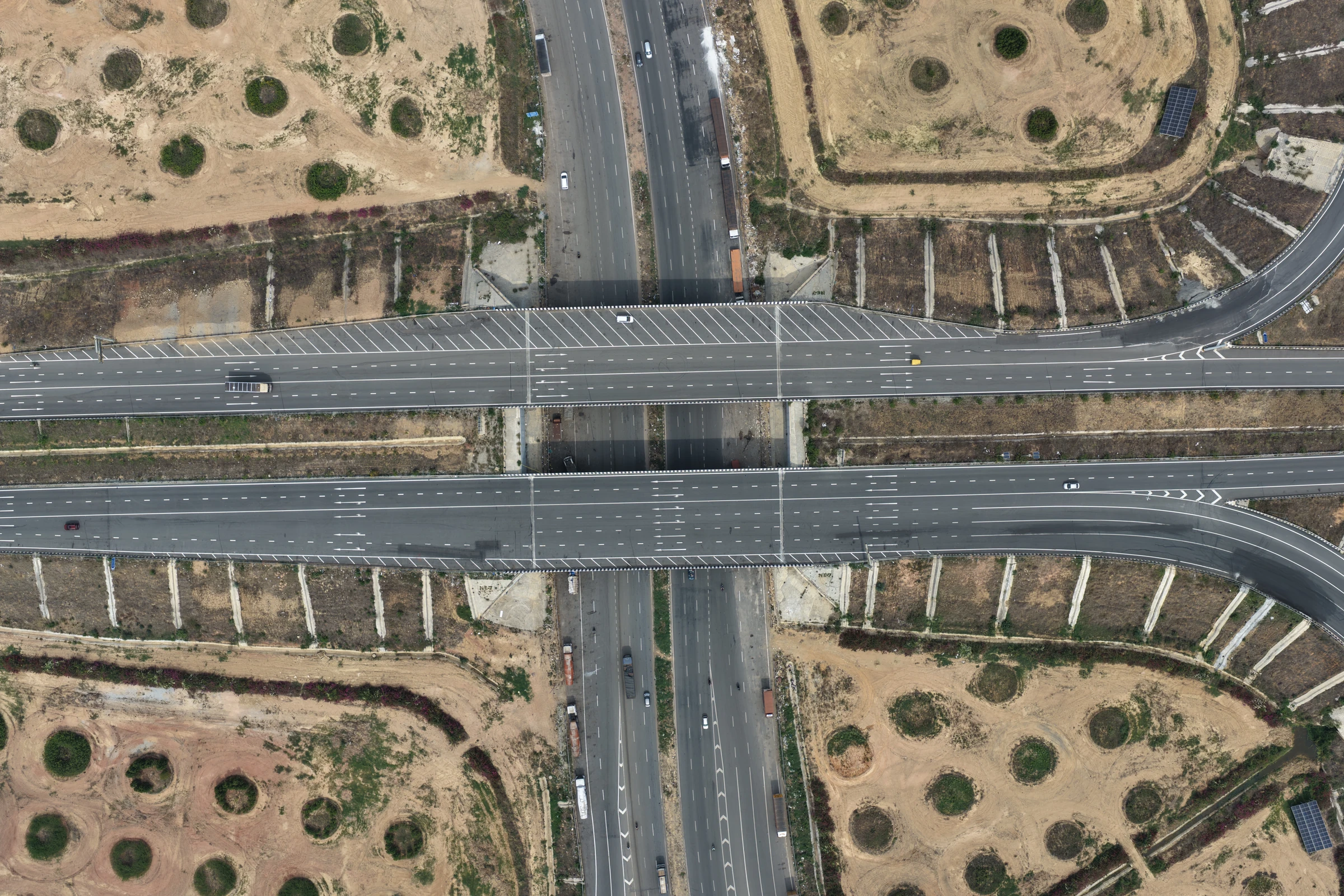 Road interchange photographed from directly above by Mamathesh Gowda